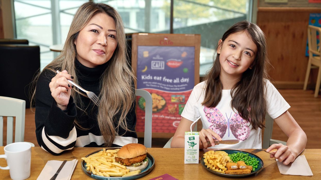 Mum and daughter eating at Morrisons Café
