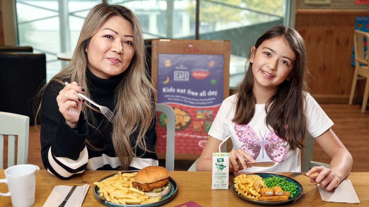 Mum and daughter eating at Morrisons