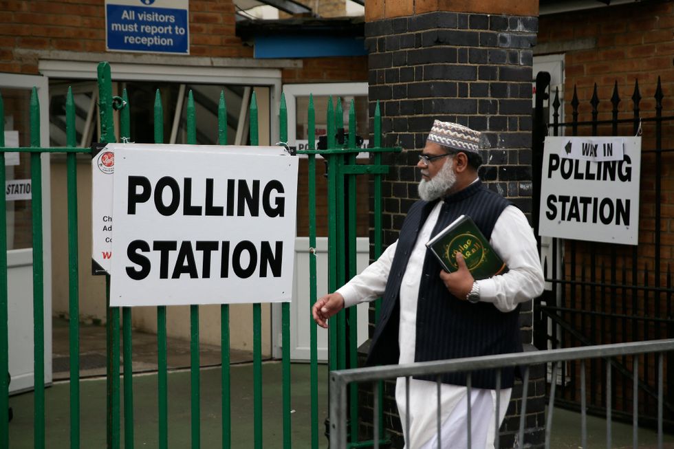 Muslim man heading to polling station