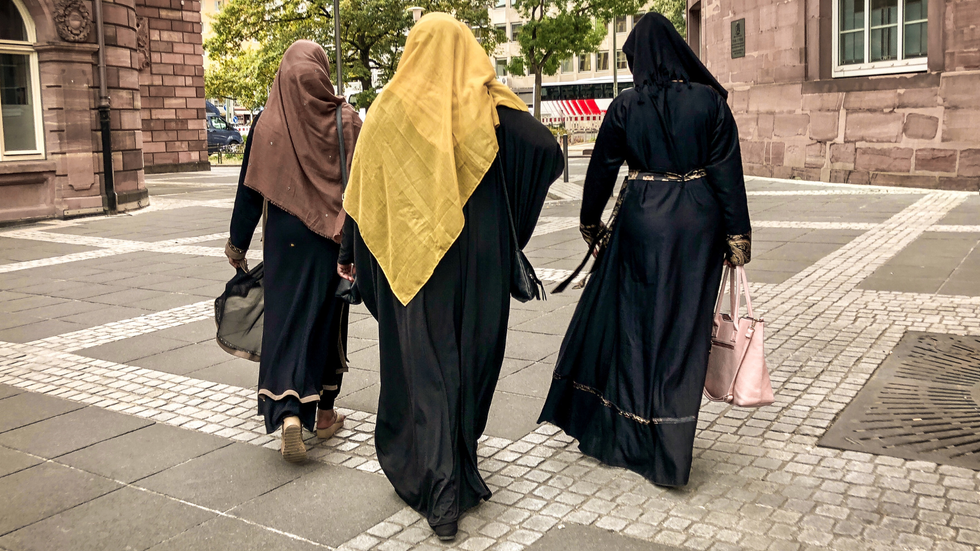 Muslim women wearing modest clothing
