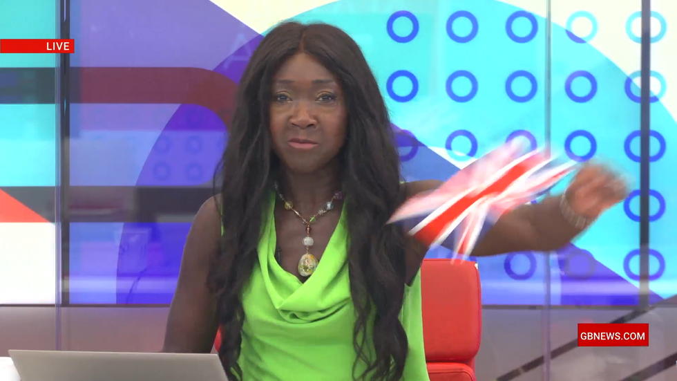 Nana Akua waves a union flag