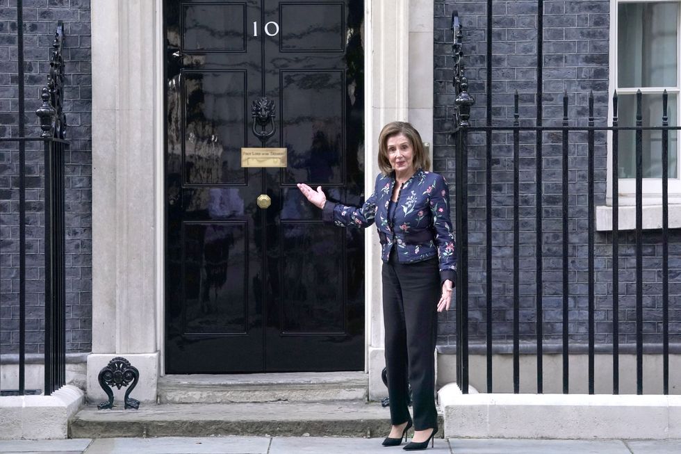 Nancy Pelosi, the Speaker of the United States House of Representatives, gestures as she arrives at 10 Downing Street, central London, for talks with Prime Minister Boris Johnson.