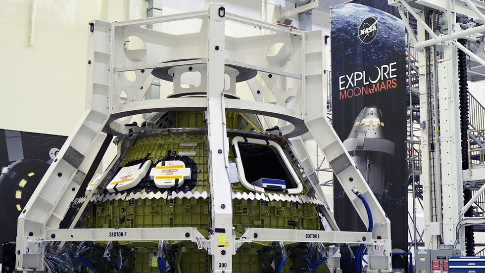 NASA's Orion crew module for the Artemis 3 mission stands in the Operations and Checkout Building during a media tour at Cape Canaveral, Florida, U.S. August 28, 2022. REUTERS/Steve Nesius