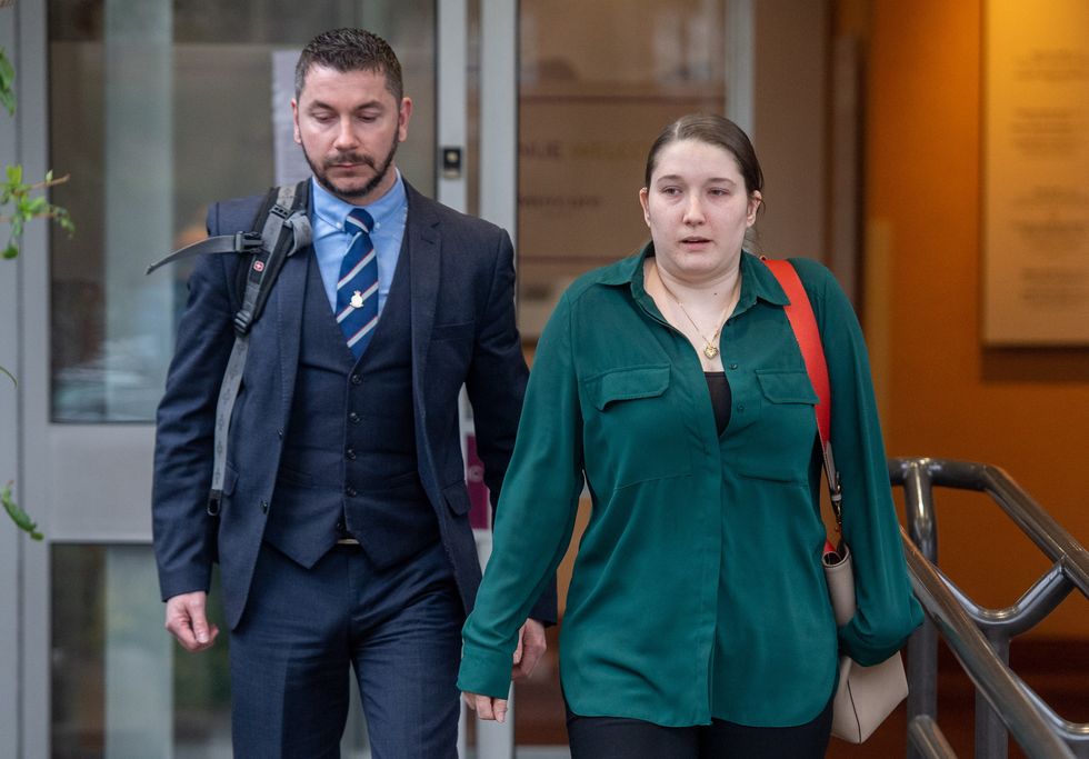 Nathan Rowe (left) and Chloe Littleboy leave after the inquest into the death of their daughter Ava-May Littleboy,
