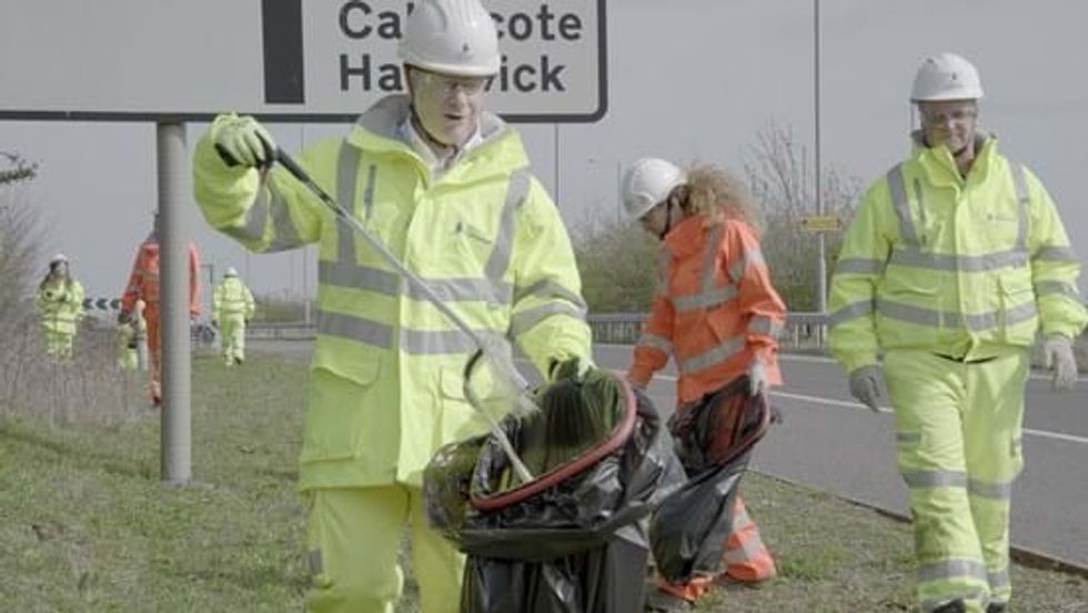 National Highways chief executive Nick Harris taking part in a litter pick