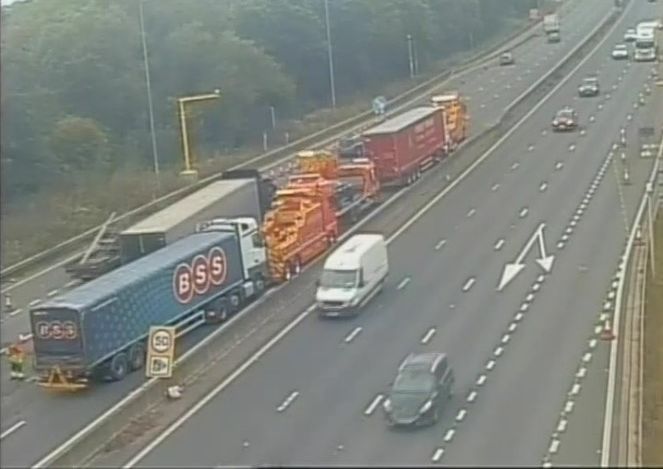 National Highways traffic officers attending the scene on the M1