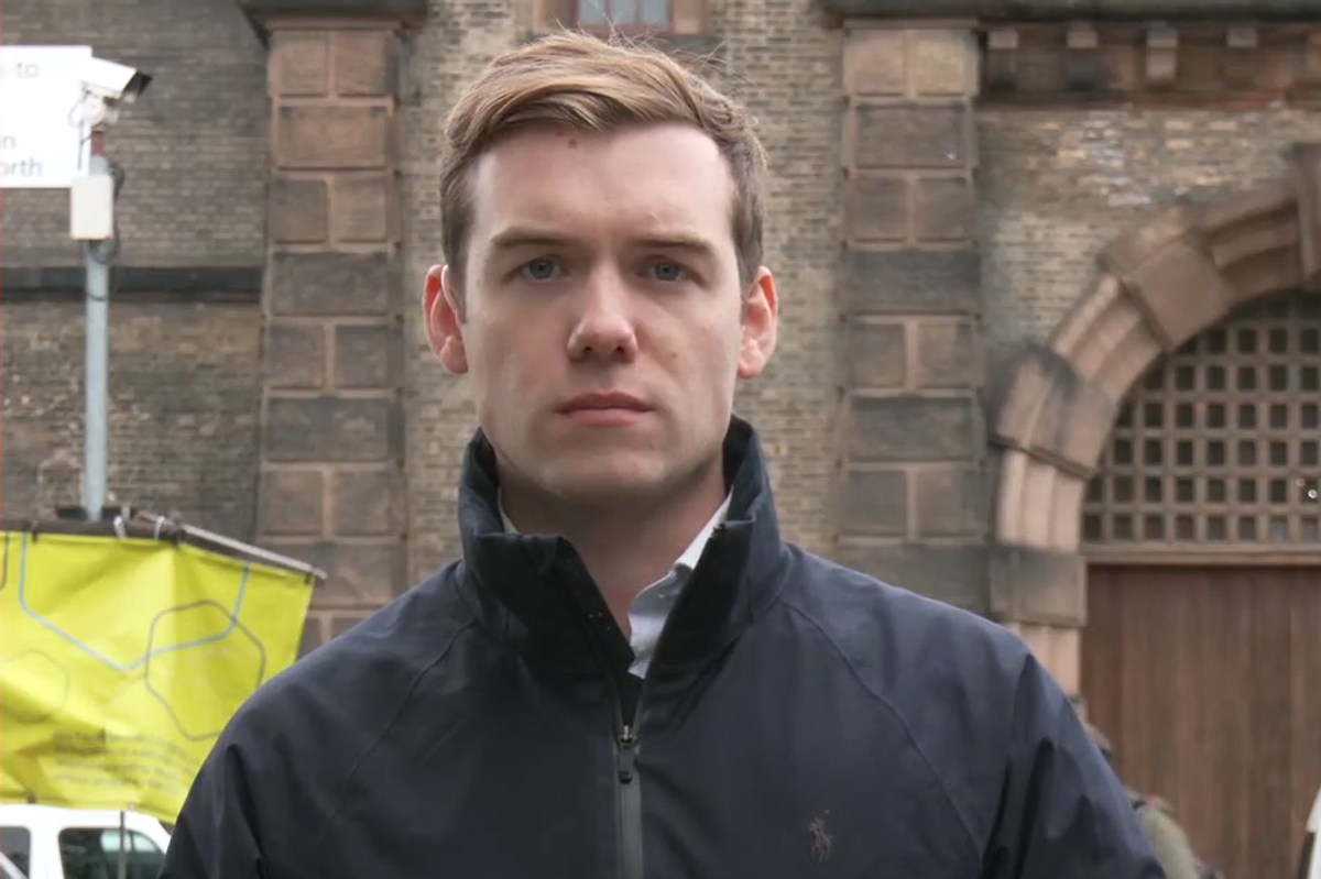 National Reporter Charlie Peters reporting from outside prison