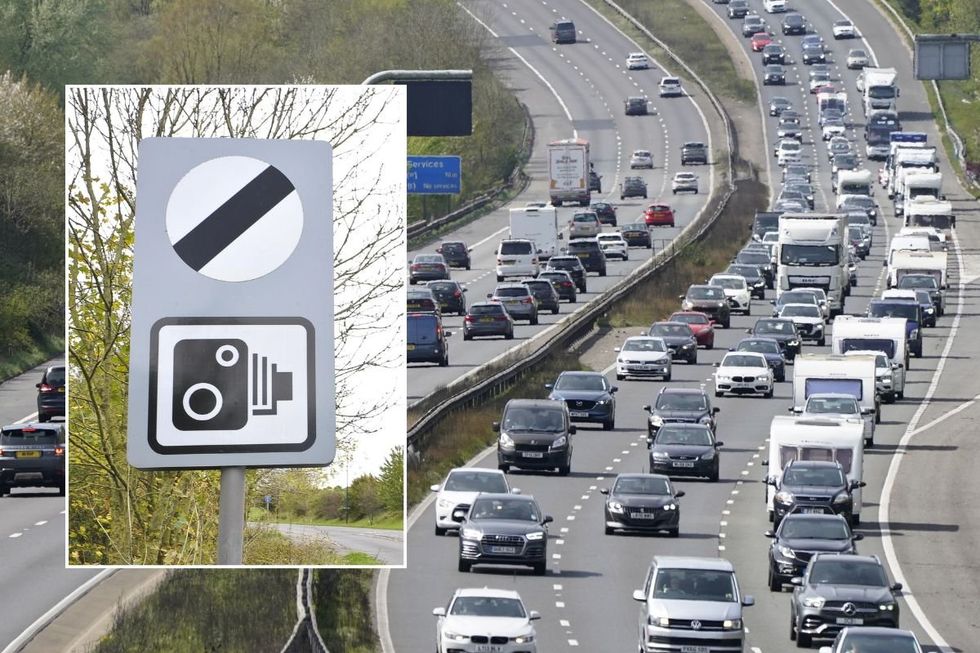 National speed limit sign and a busy motorway of traffic