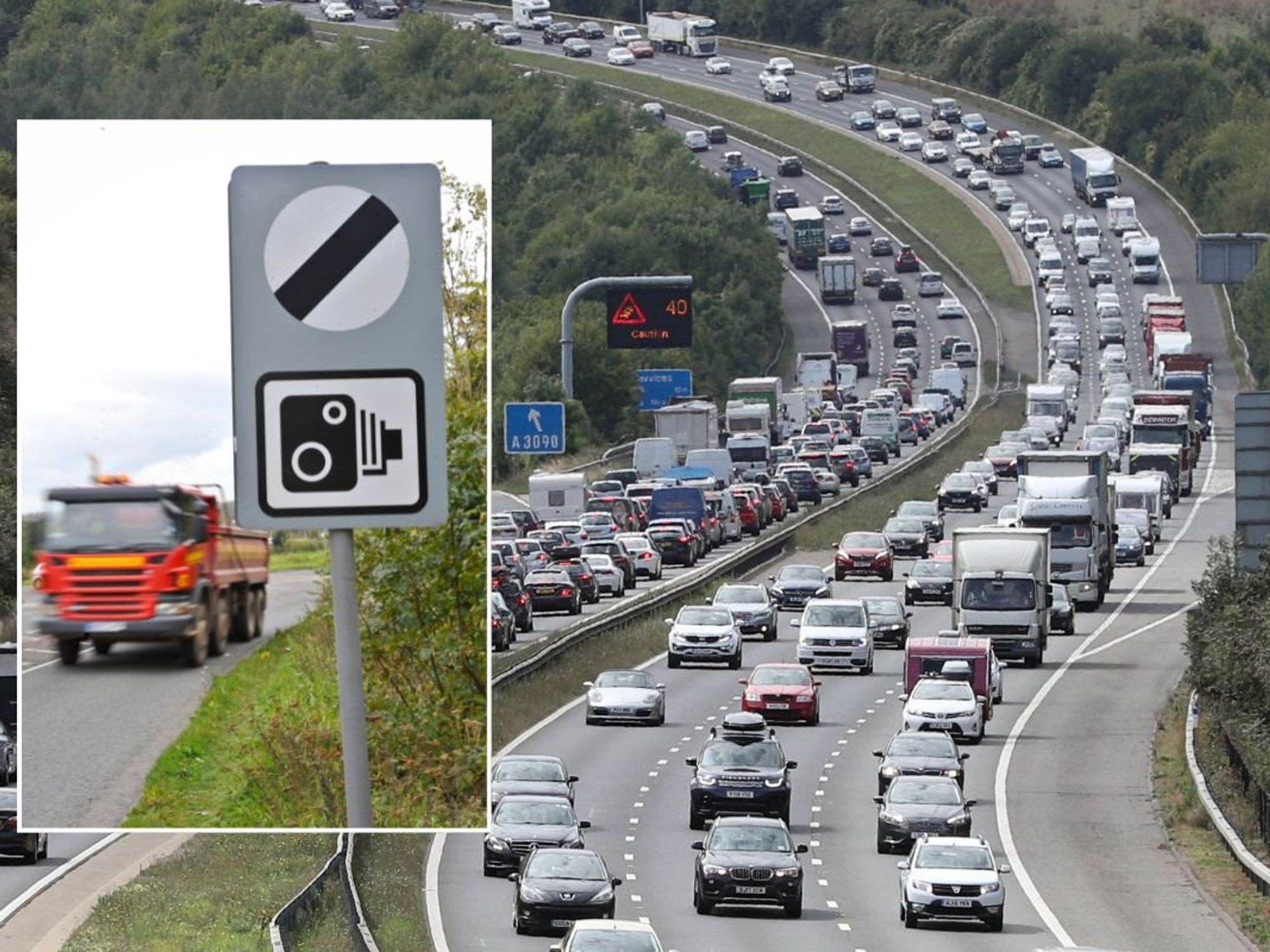 National speed limit sign and a busy motorway