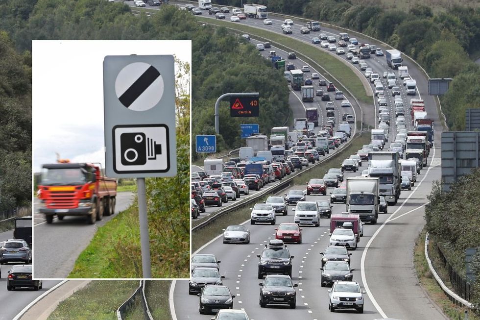 National speed limit sign and a busy motorway
