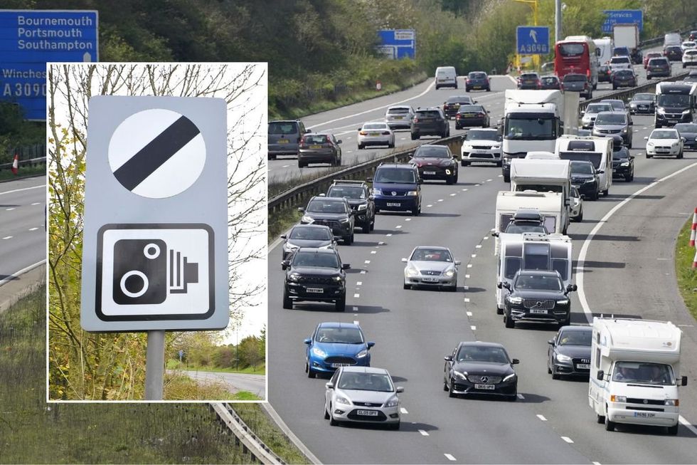 National speed limit sign and a busy motorway
