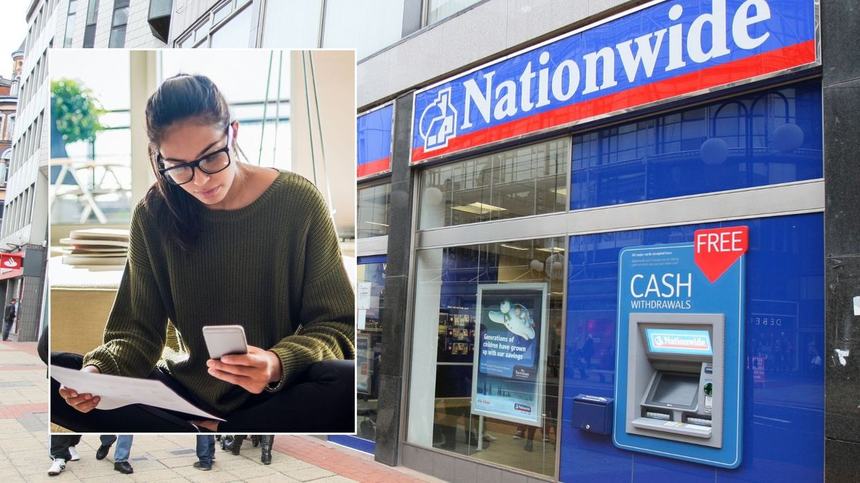 Nationwide branch and woman looking at phone