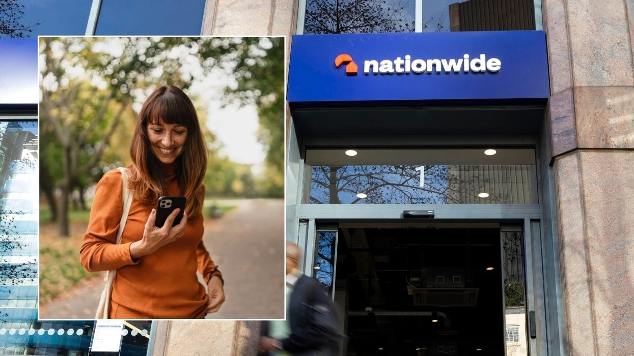 Nationwide branch and woman looking at phone