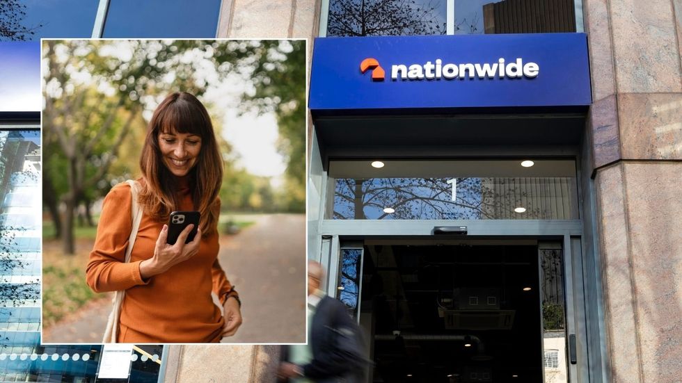 Nationwide branch and woman looking at phone