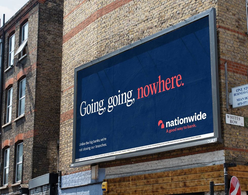 Nationwide says branch footfall has risen as building society backs