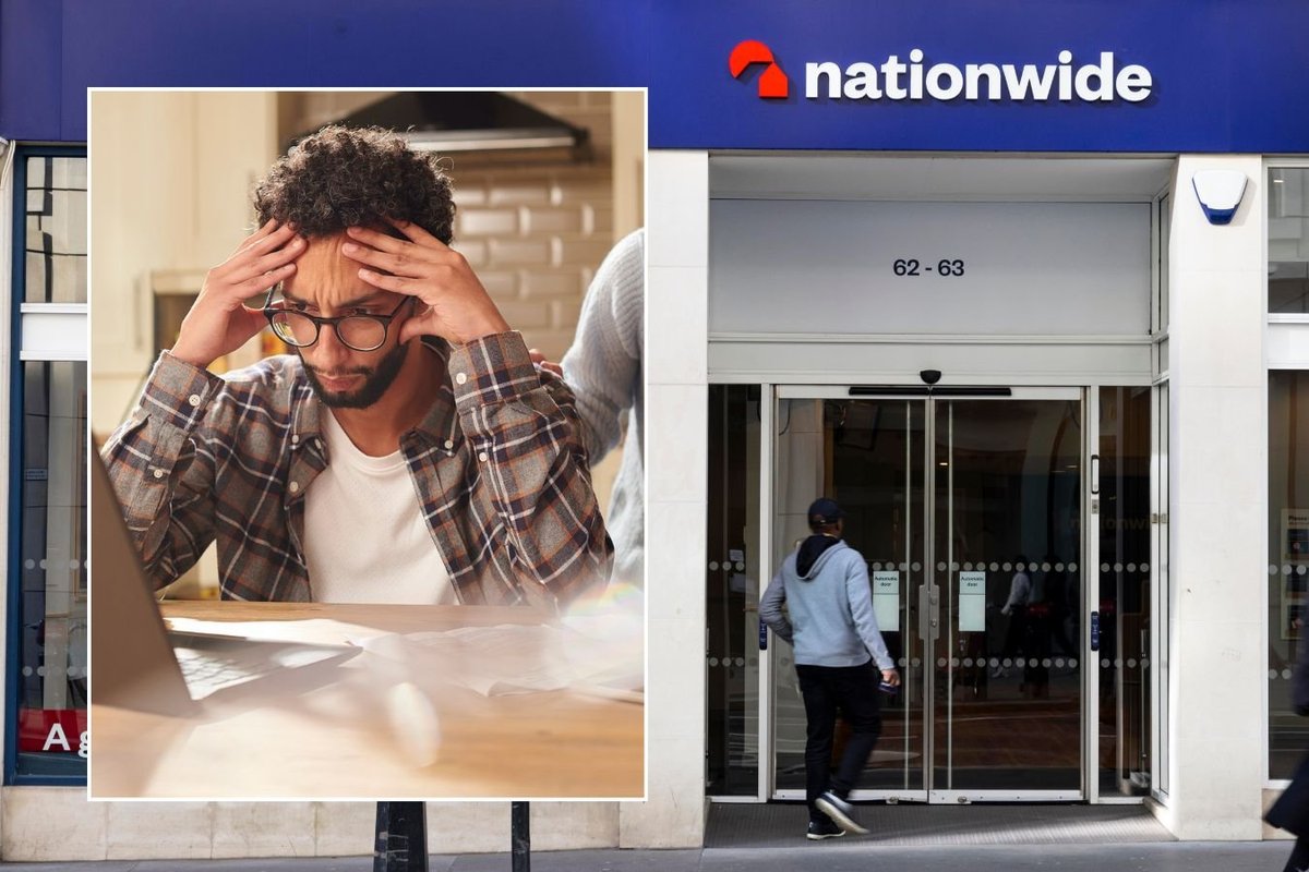 Nationwide Building Society branch and young man looking worrid