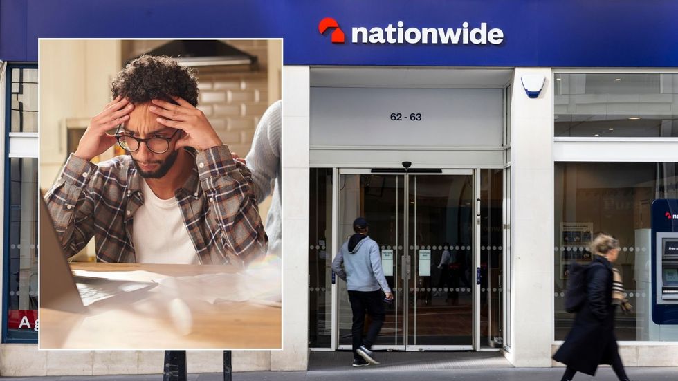 Nationwide Building Society branch and young man looking worrid