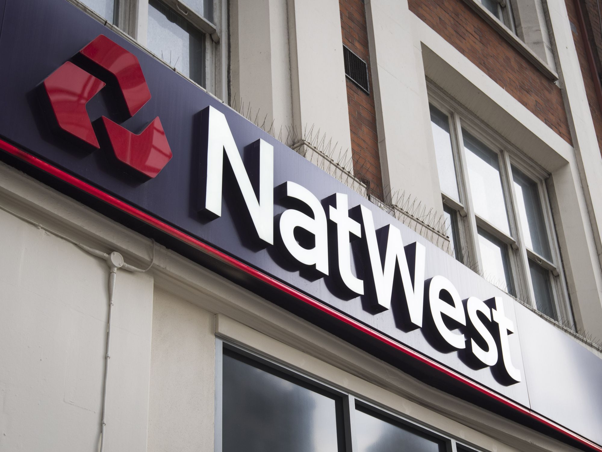 NatWest bank branch logo on high street