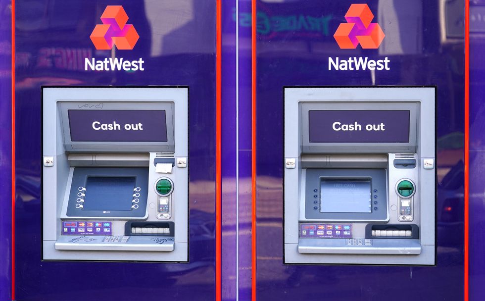 NatWest sign on ATM outside of bank branch
