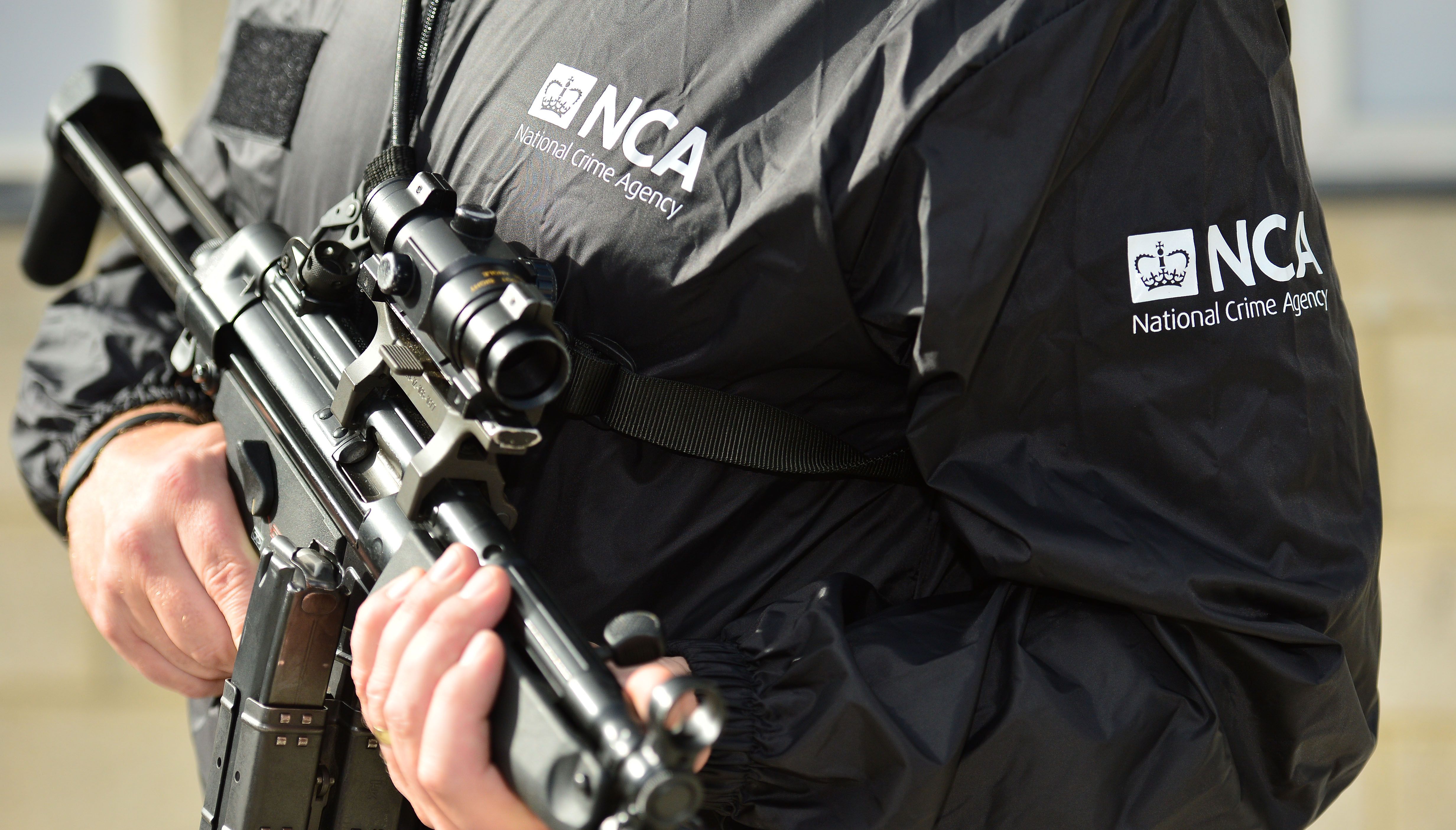 NCA armed officer.