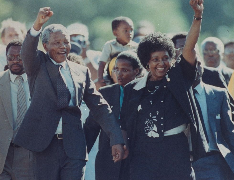 Nelson Mandela and wife Winnie raising fists upon his release from Victor Verster prison