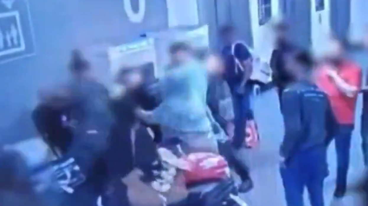 New footage appears to show the lead up to a viral clip where a man was stamped in the head