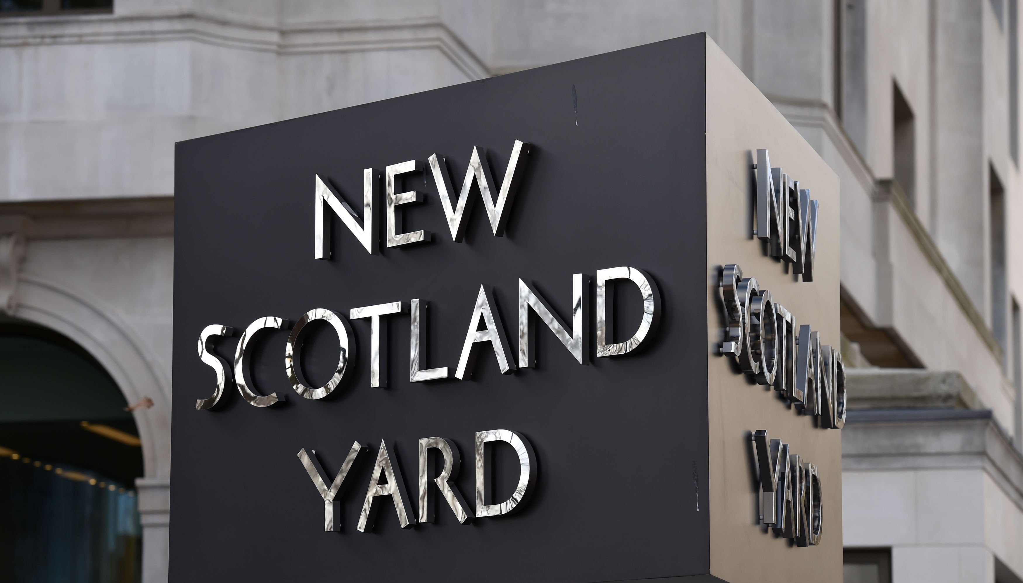 New Scotland Yard sign outside the headquarters of the Metropolitan Police.