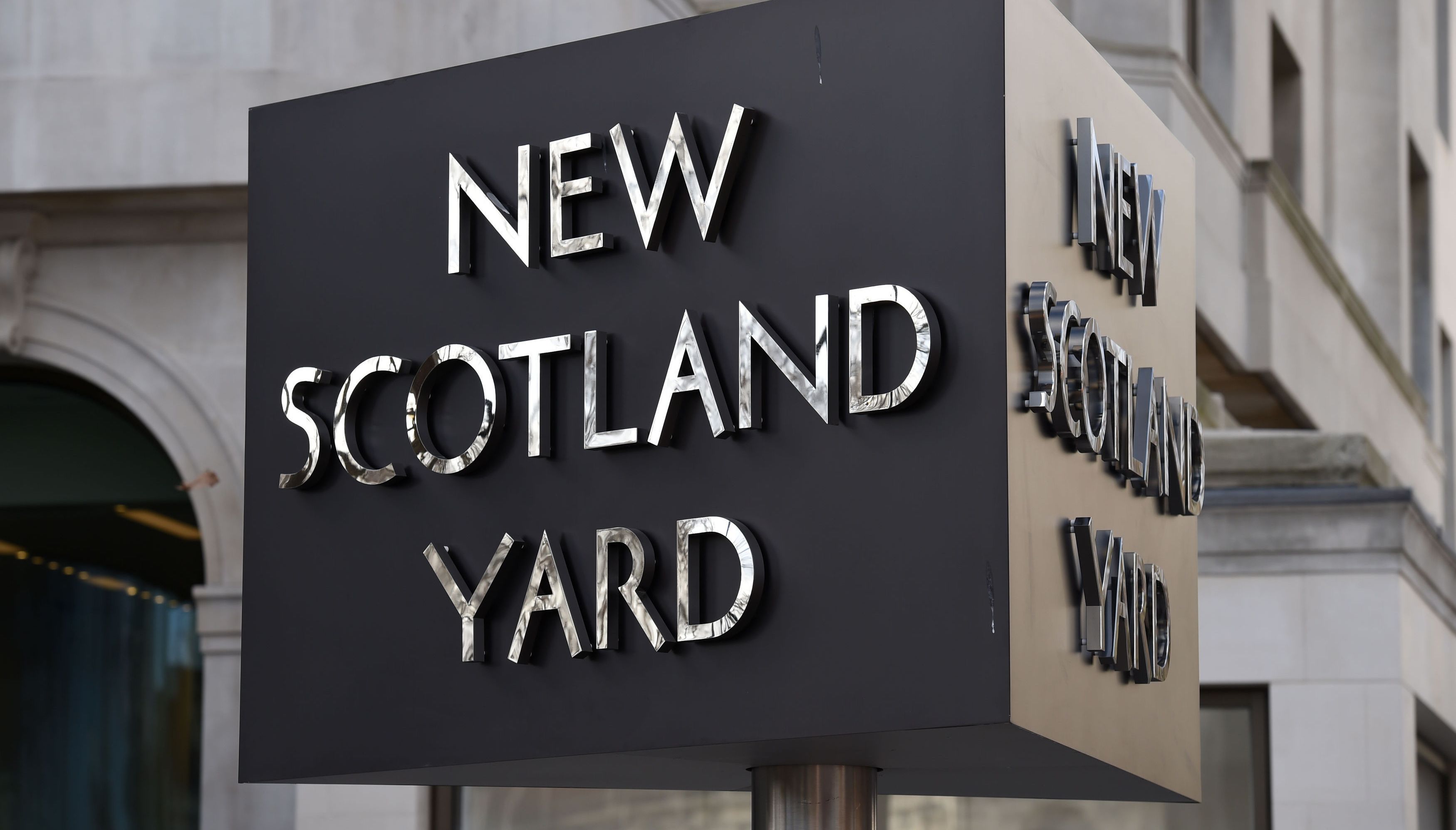 New Scotland Yard sign outside the headquarters of the Metropolitan Police.