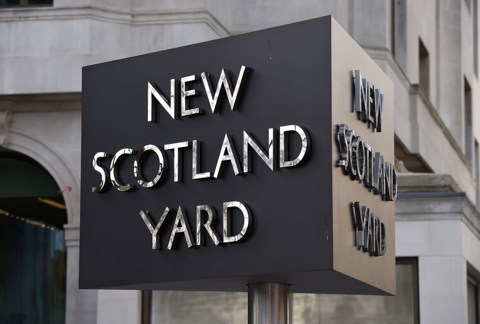 New Scotland Yard sign, outside the headquarters of the Metropolitan Police.
