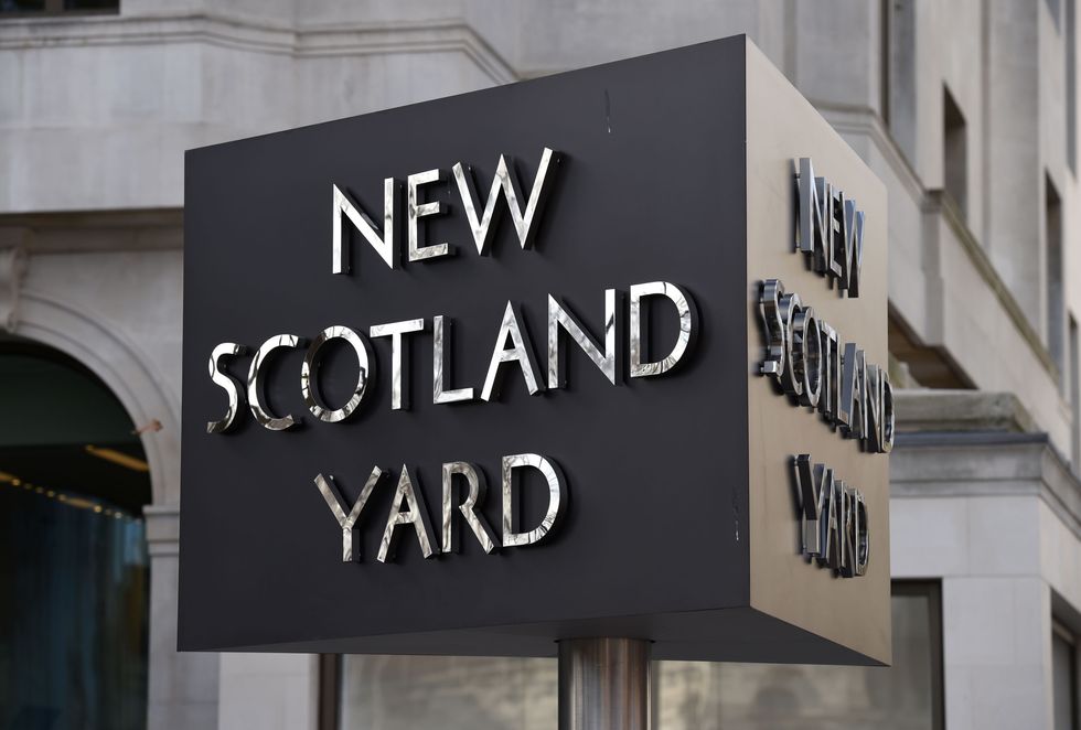 New Scotland Yard sign outside the Metropolitan Police headquarters in London.