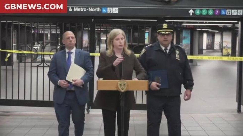 Machete-wielding man shot dead by police after launching attack inside New York City subway