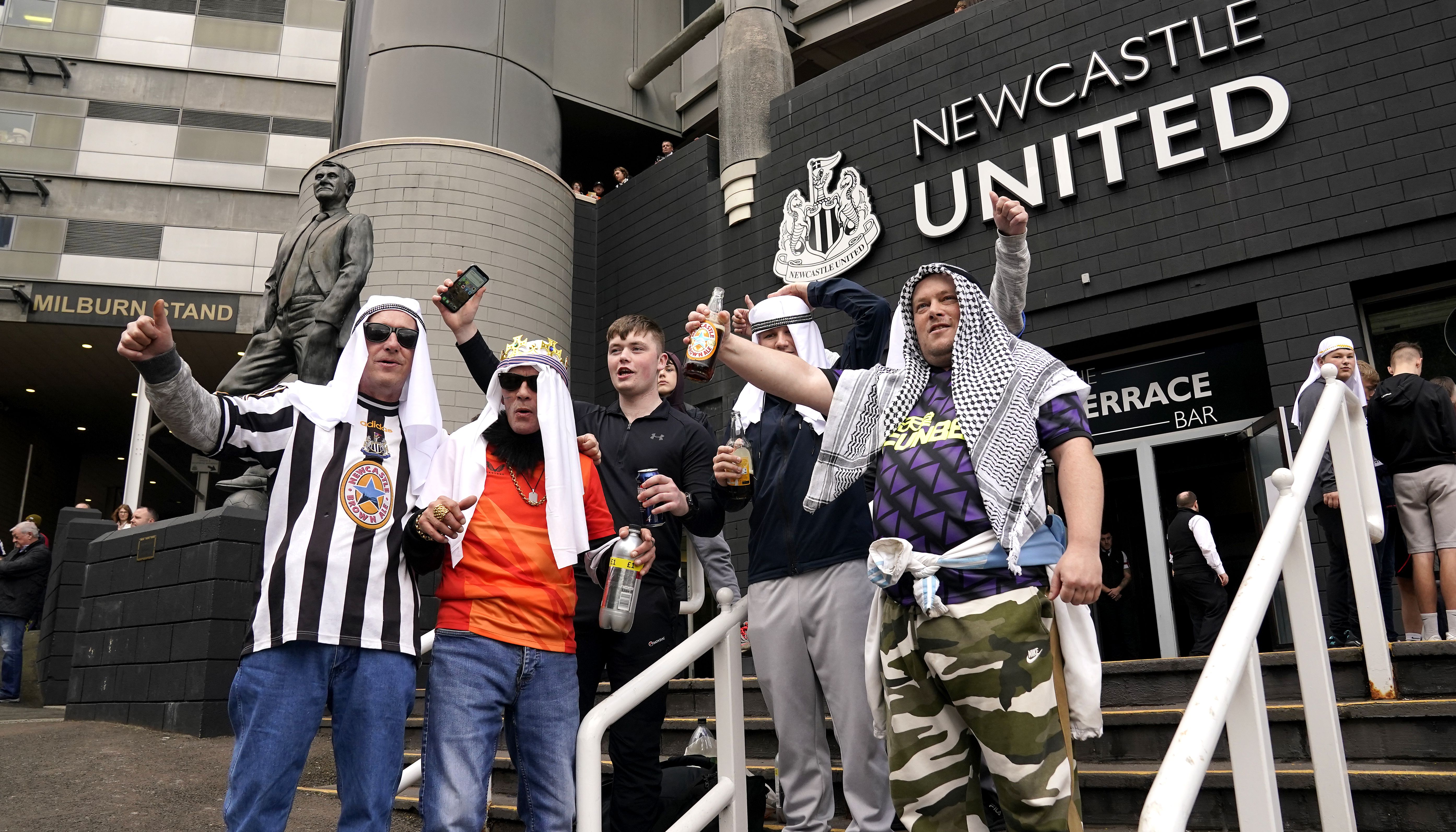 Newcastle have asked fans celebrating the club's Saudi-backed takeover not to wear Arab-style clothing for matches in case it causes offence to others.