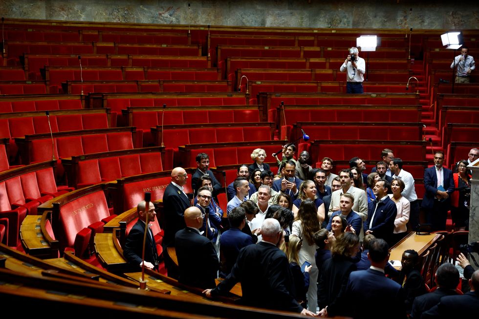 Newly elected lawmakers make entrance into the National Assembly in Paris