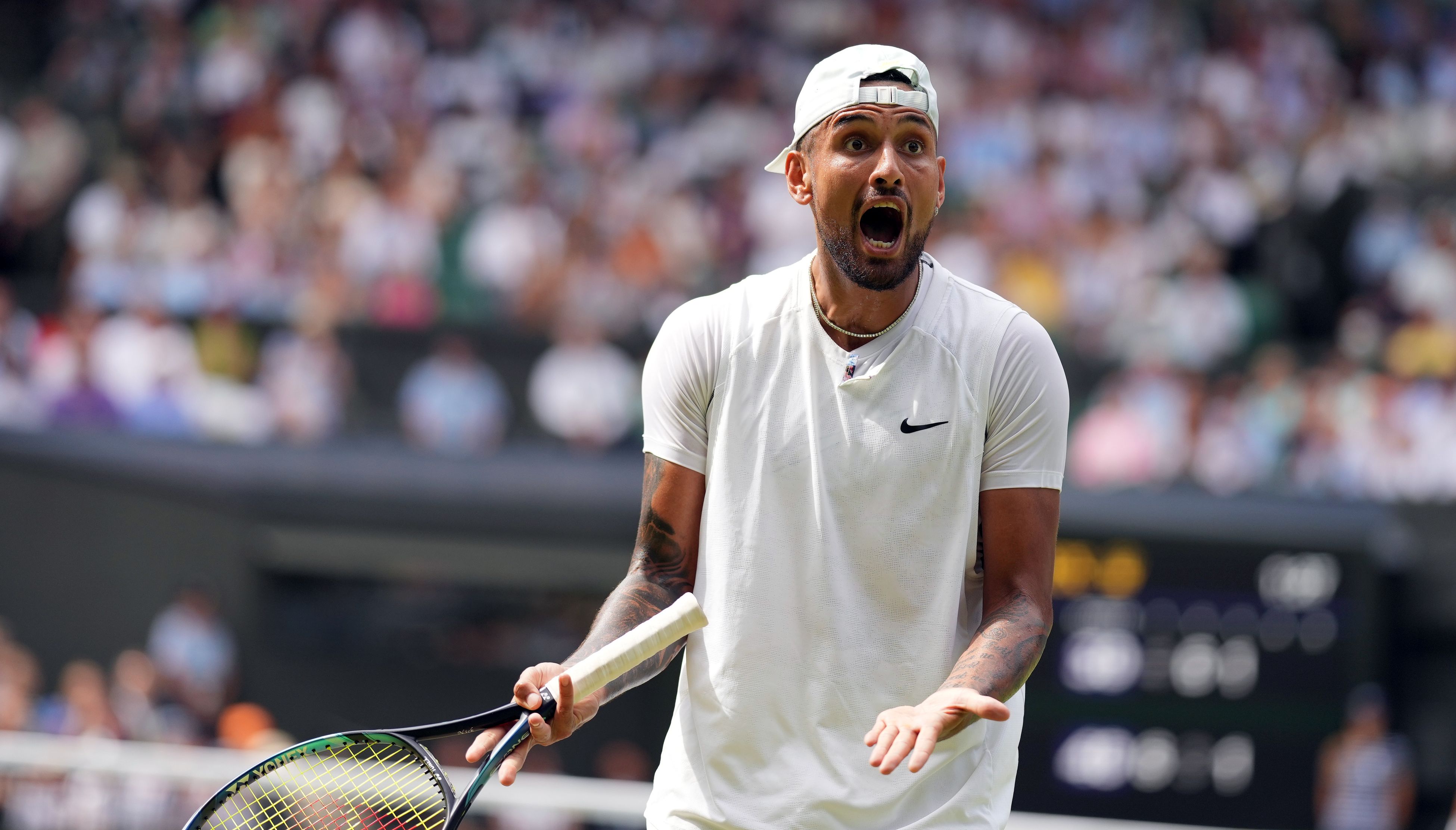 Nick Kyrgios reacts during The Final of the Gentlemen's Singles against Novak Djokovic on day fourteen of the 2022 Wimbledon Championships at the All England Lawn Tennis and Croquet Club, Wimbledon.