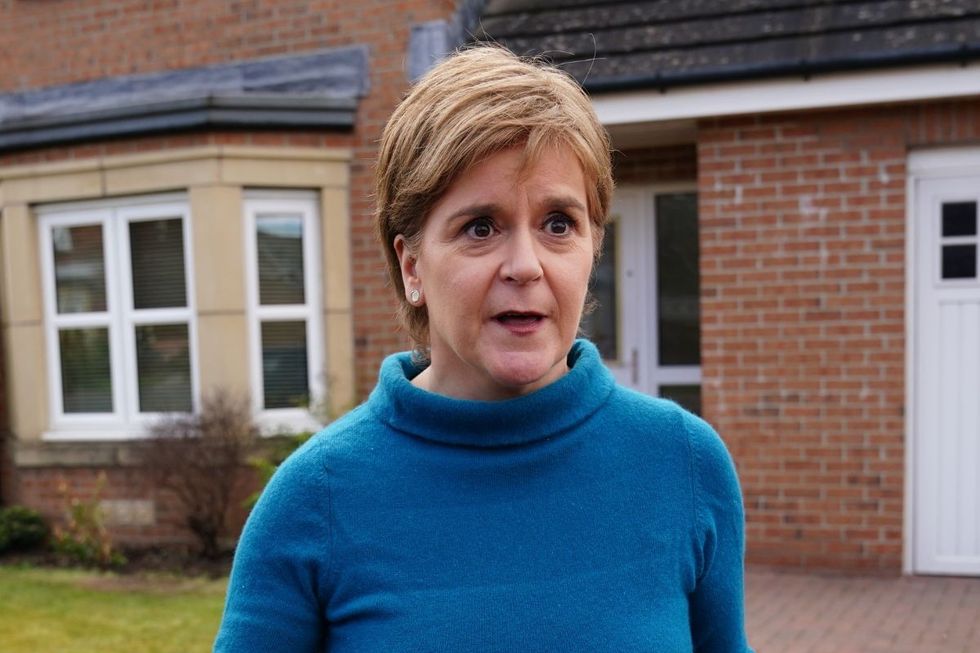 Nicola Sturgeon outside her house