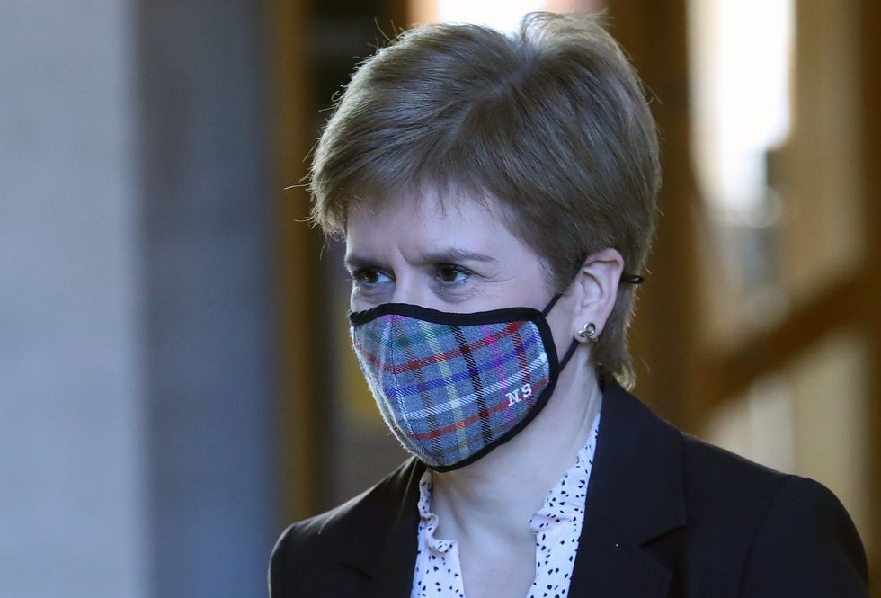 Nicola Sturgeon wearing a mask