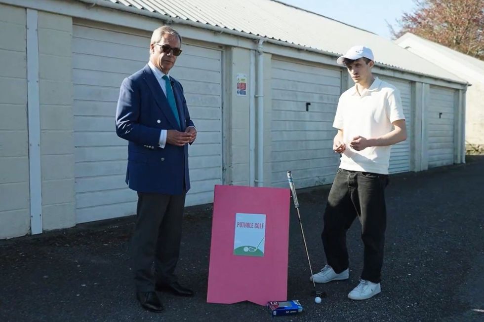 Nigel Farage and campaigner Ben playing 'pothole golf'