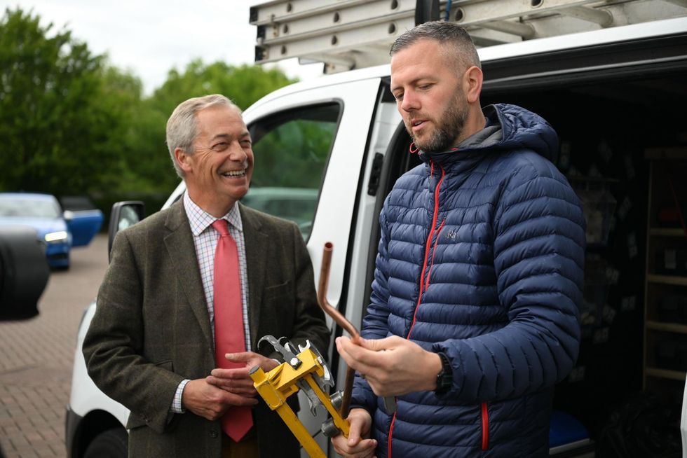 Nigel Farage and Rob Kenyon on the campaign trail in Makerfield