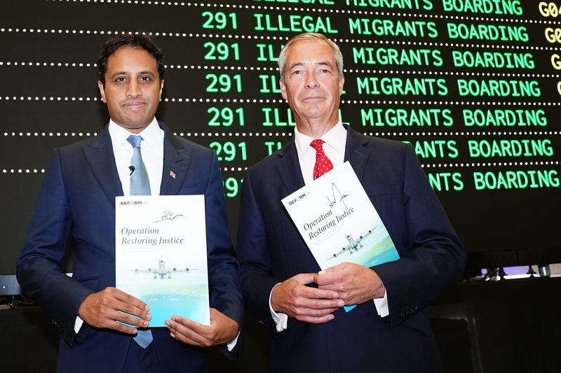 Nigel Farage and Zia Yusuf at the launch of Reform UK’s plan to deport asylum seekers, at Oxford Airport in Oxfordshire