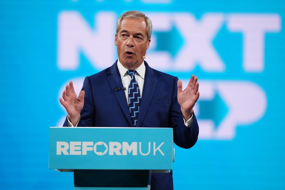 Nigel Farage delivering his speech at the NEC