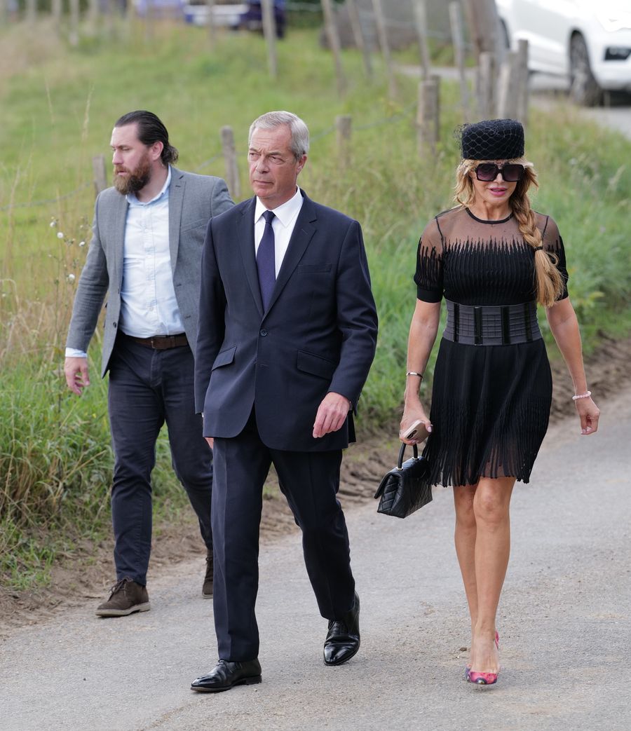Nigel Farage led mourners at James Whale's funeral