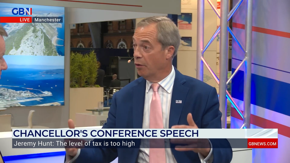 Nigel Farage presents on GB News