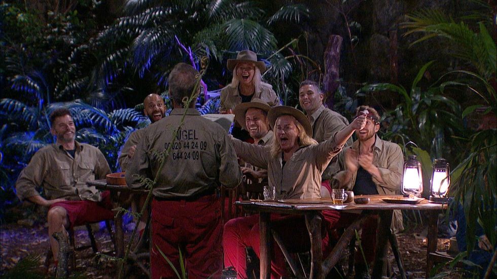 Nigel Farage rips open his shirt