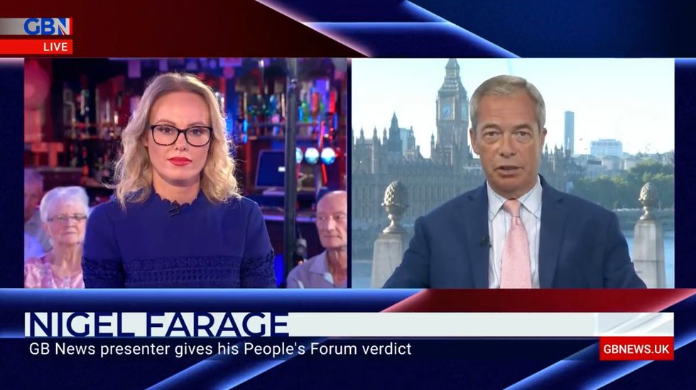Nigel Farage speaking to Michelle Dewberry after the People's Forum