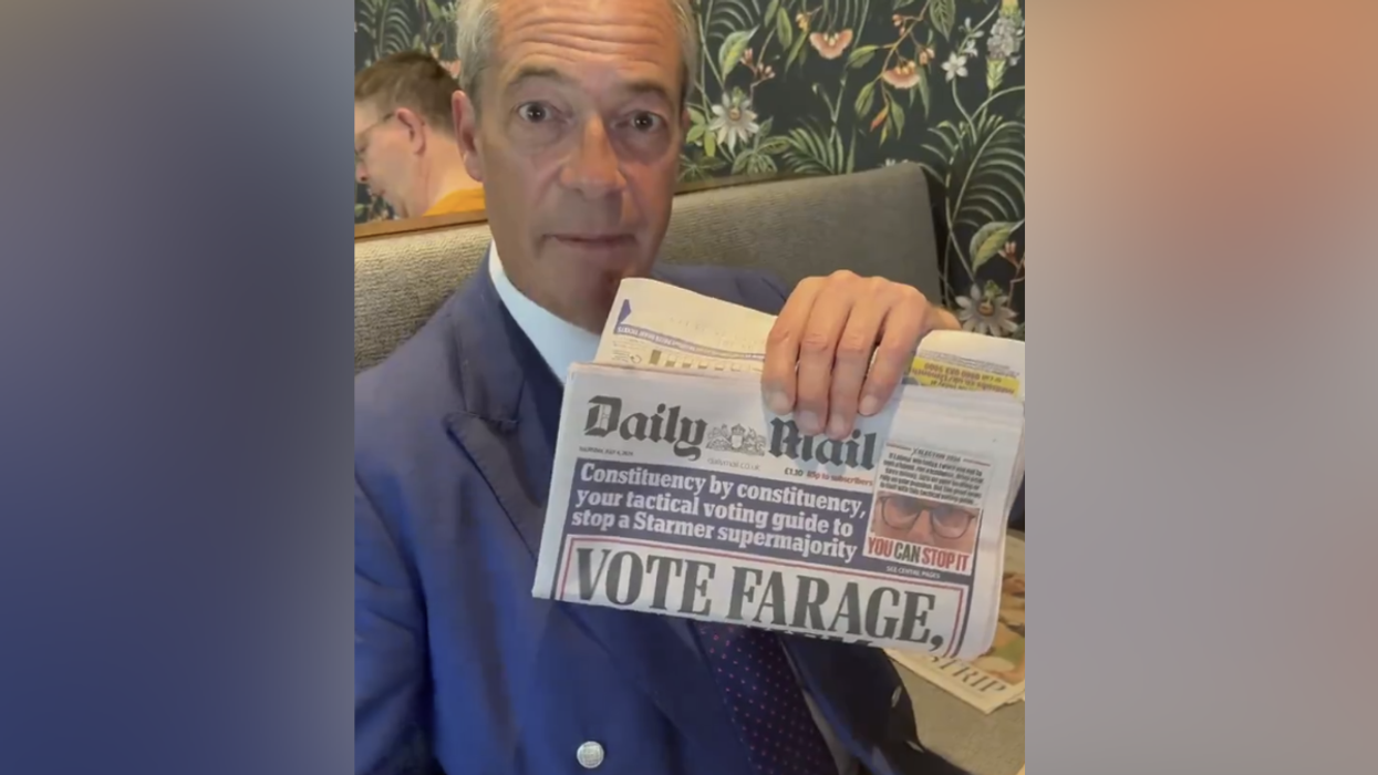 Nigel held up a copy of today's paper