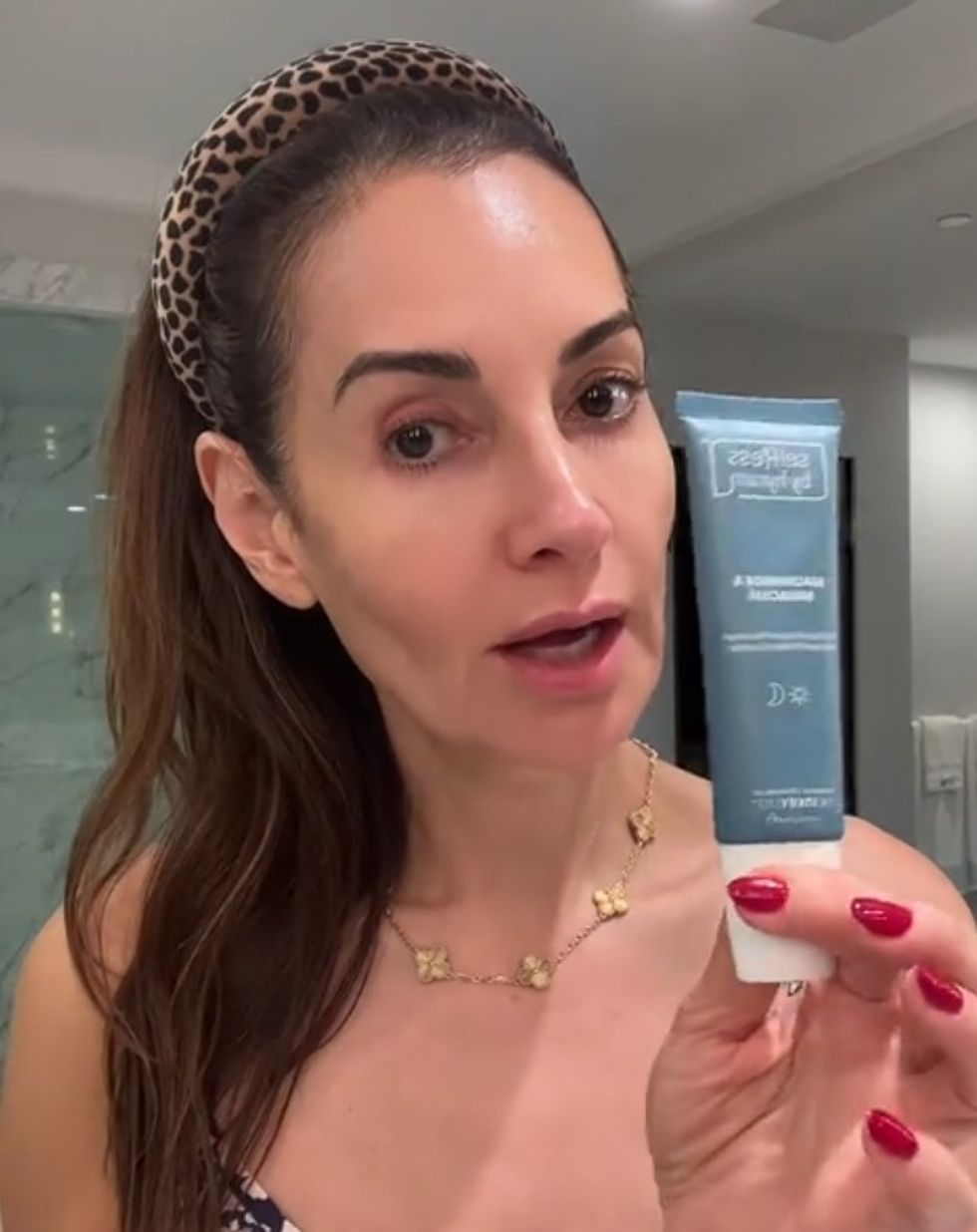 Nina demonstrates skin care routine