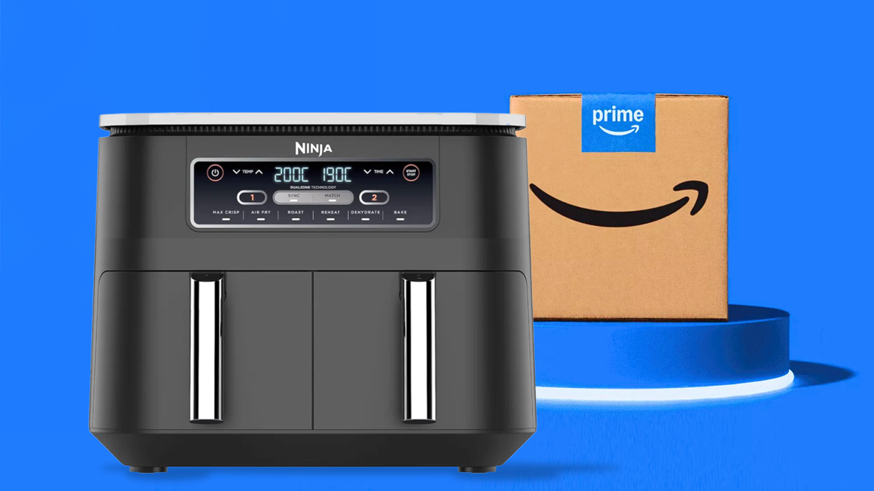 ninja foodi dual zone air fryer on the left-side with an amazon prime box on the right