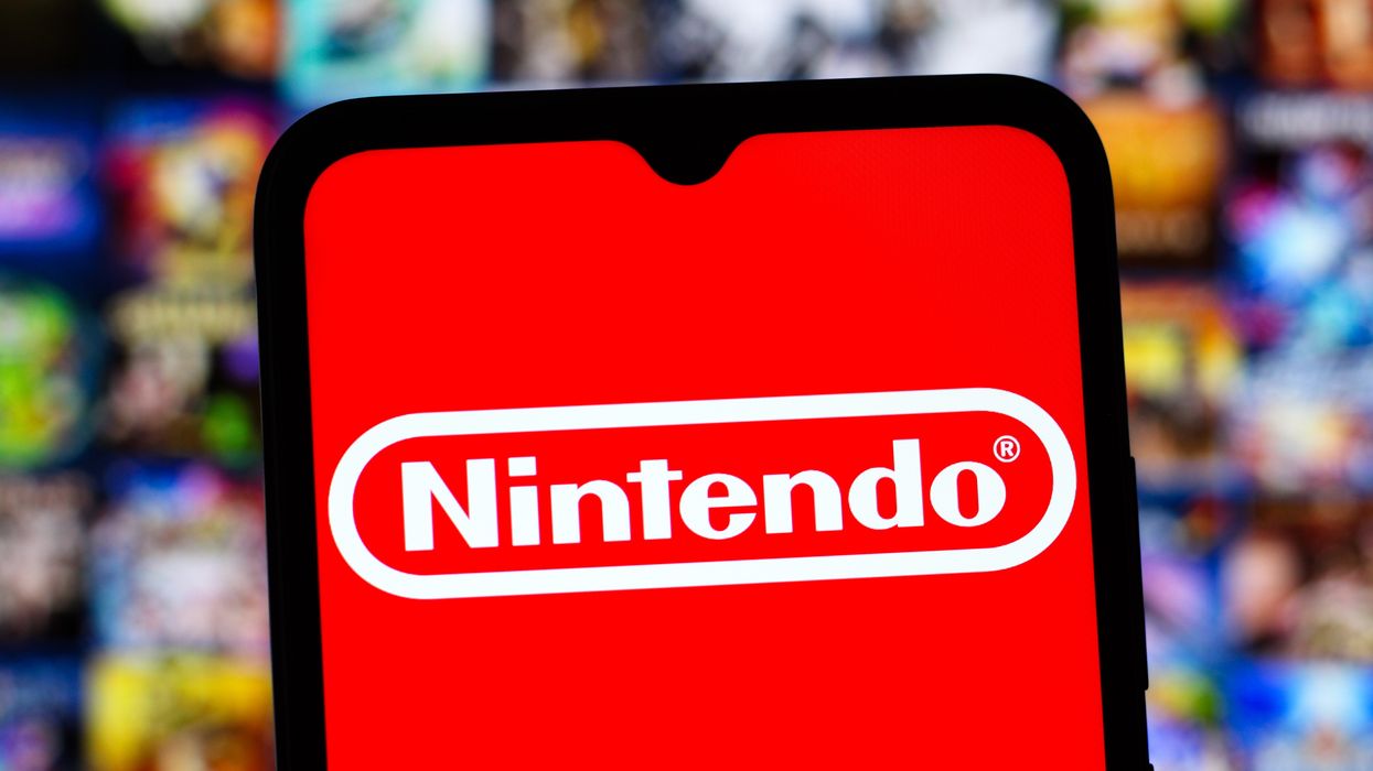 Nintendo logo on phon with colourful background