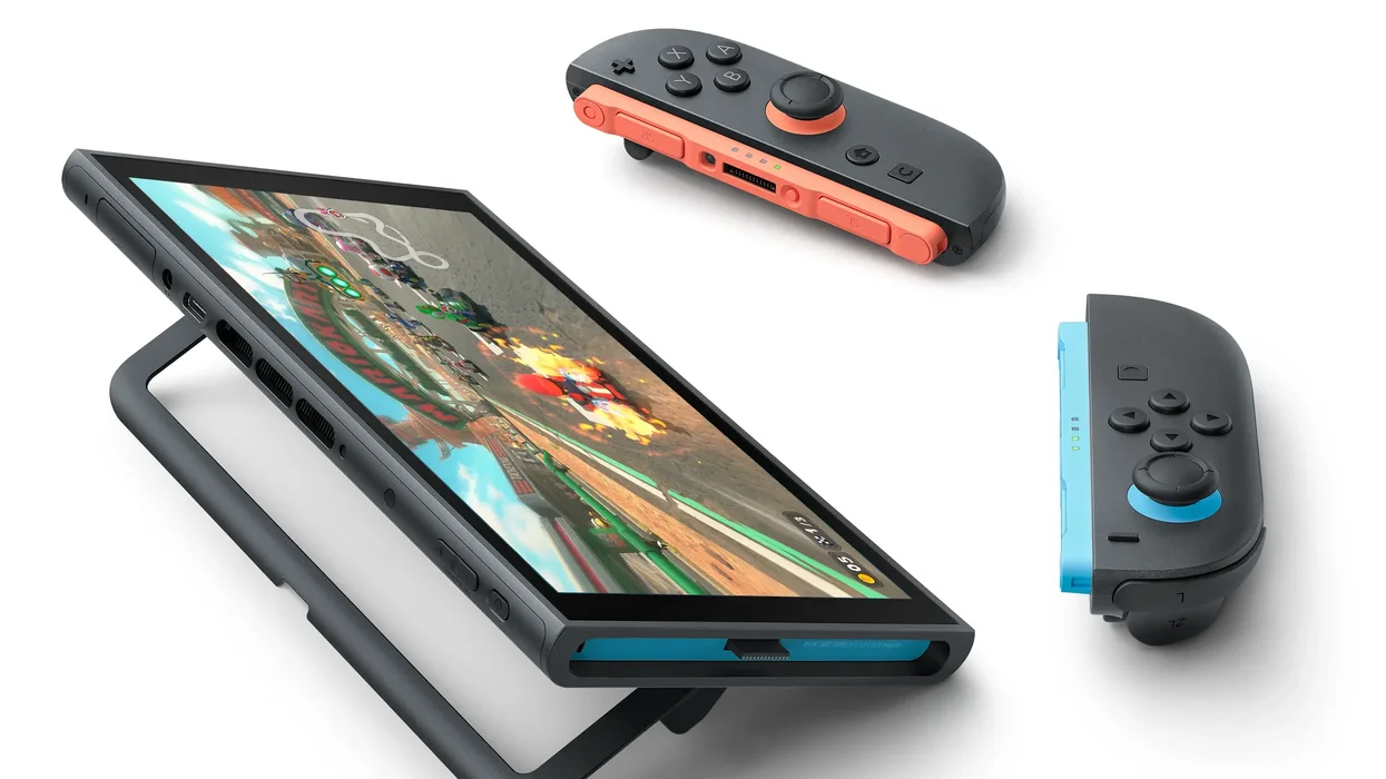 Nintendo Switch 2 console pictured in tabletop mode with the colourful Joy-Con 2 controllers resting on the table