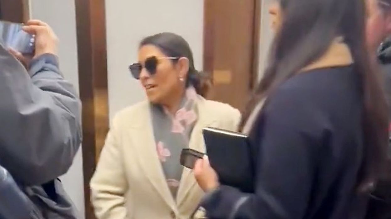 'You should be ashamed!' Priti Patel heckled as MP mobbed by furious eco-zealots